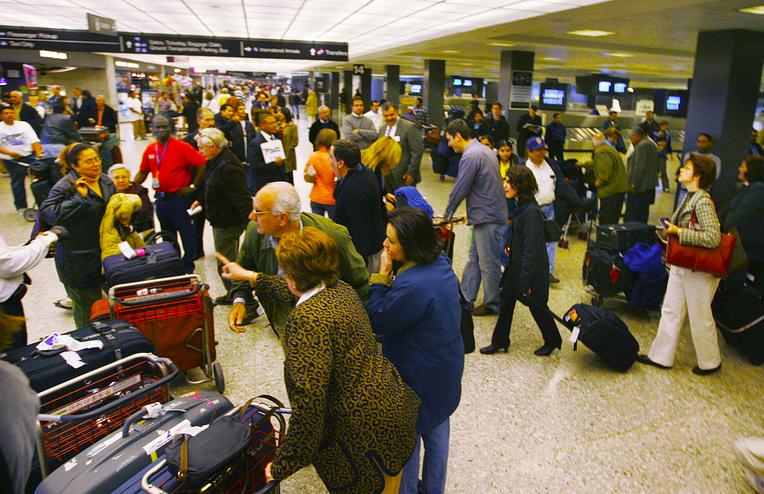 Ukraine airport arrivals to walk mats soaked with disinfectant 