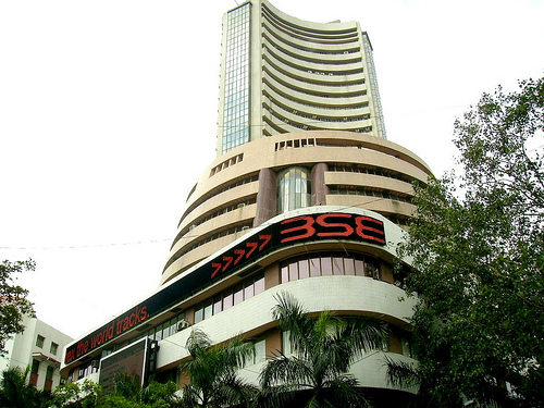 Sensex trades flat as automobile, bank stocks plummet