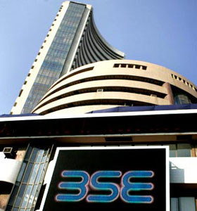 Sensex trades flat in pre-noon session