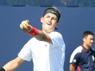 Tomic makes history as youngest-ever winner 