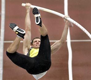 Holder Walker pulls out of pole vault