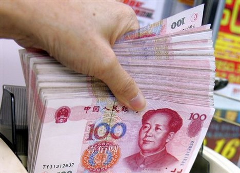 Labor Union urges Congress to pass bill to fight China's currency   