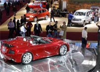 Subdued Detroit auto show reflects economic realities