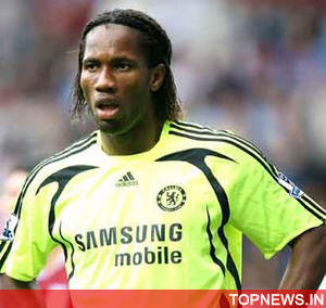 Chelsea striker Drogba facing FA action over coin throw