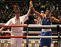 Dinesh Kumar advances into quarters of WBC