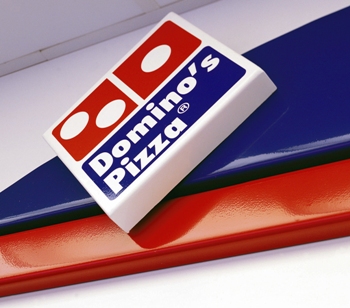 Domino’s to slow expansion in Germany