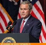 Bush marks Veterans Day at rededication of aircraft carrier museum 