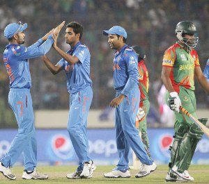 India sails into World T20 semis following eight-wicket win over Bangladesh