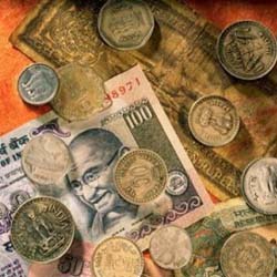 Indian Currency Gains 21 Paise To 46.66 Vs Dollar