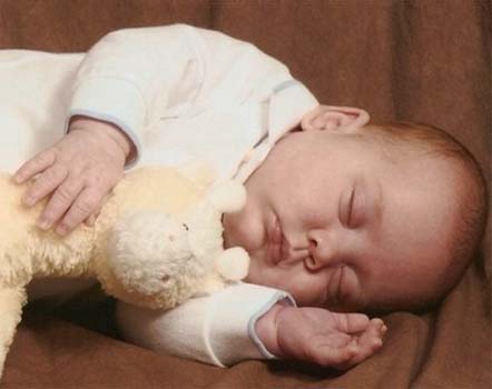 Head covering linked to sudden infant death, German researchers warn