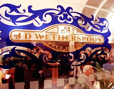 JD Weatherspoon posts record profit; to resume dividend