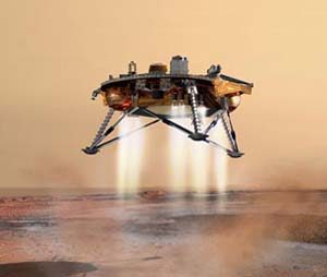 Phoenix Mars Lander finds possible ice on Red Planet