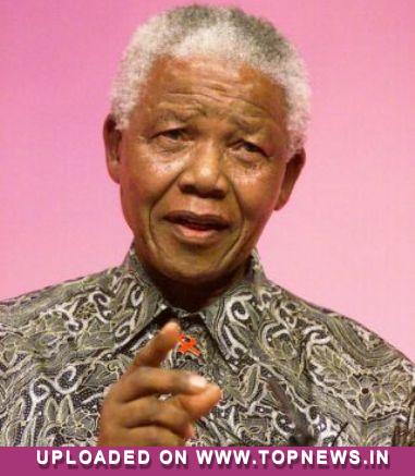 Mandela doing well at home, says S. African presidency 