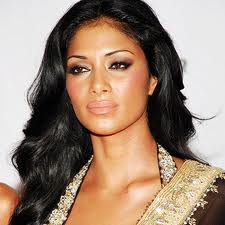 Nicole Scherzinger poses seductively while promoting new single 
