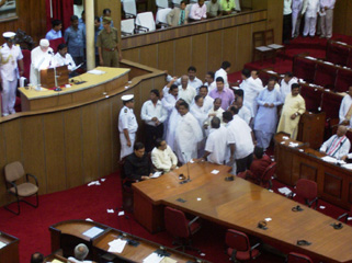 Snake catcher on guard at state assembly