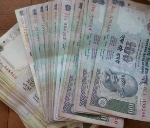 Rupee touches lowest level in a week