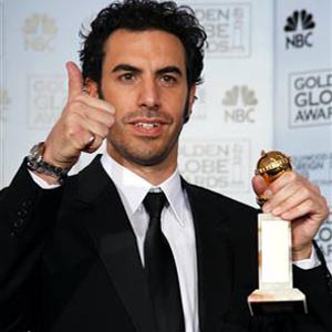 Sacha Baron Cohen apologises to Madge over African adoption dig