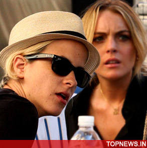  Lohan ‘overspending’ lover Samantha Ronson’s cash