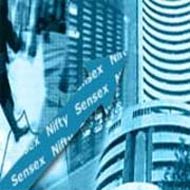 Sensex trades flat; bank, FMCG stocks plummet