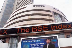 Sensex slips from intra-day high, metal stocks gain