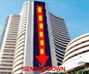 Sensex dips in pre-afternoon trade