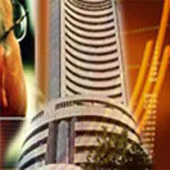 Benchmark indices subdued, midcaps rise