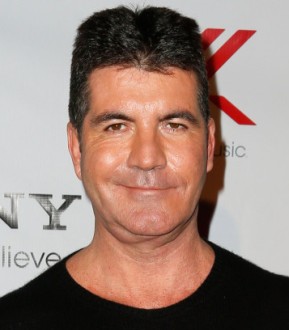 Cowell holidays with former fiancee