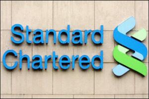 Standard Chartered bank accused of diverting money to Mugabe