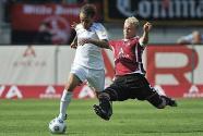 Schalke's defender Rafinha (L) and Nuremberg's defender Andreas Wolf