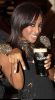 Alexandra Burke  tries a pint of Guinness as she parties at the Dandelion Cafe Bar and Club in Stephen sGreen Dublin