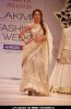 Amrita Arora walk the ramp for designer Vikram Phadnis on day 1 of the Lakme Fashion Week at Grand Hyatt in Mumbai