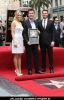 Carrie Underwood and Ryan Seacrest at Simon Fuller Honored with a Star on the Hollywood Walk of Fame on May Honored with a Star
