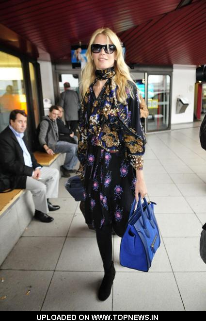 Claudia Schiffer arriving at Tegel Airport after flying in from London for the Vogue Berlin Fashion Night Out Claudia Schiffer arriving at Tegel Airport after flying in from London for the Vogue Berlin Fashion Night Out