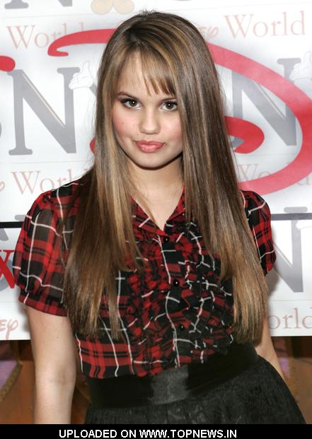 Debby Ryan at The Suite Life on Deck Cast Appears at World of Disney