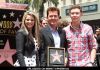 Lauren Alaina and Scotty McCreery at Simon Fuller Honored with a Star on the Hollywood Walk of Fame on May Honored with a Star Lauren Alaina and Scotty McCreery at Simon Fuller Honored with a Star on the Hollywood Walk of Fame on May Honored with a Star