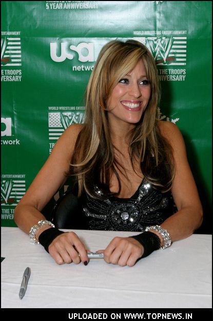 WWE star Lilian Garcia collect toys for tots and sign autographs at the NBC