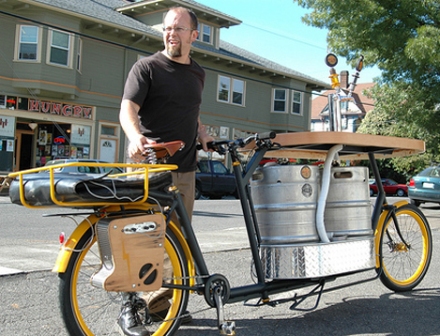 Now a party bike that holds two beer kegs, bags of ice, pizza tray, sound system!