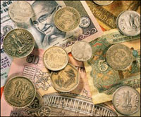 Rupee trades lower compared to US dollar