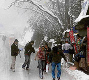 Tourists enjoy season''s first snowfall in Shimla