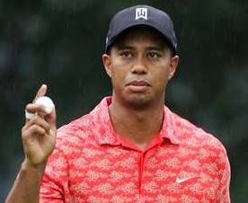 Champion Woods struggles in rain-delayed first round at US Open 