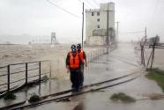 450 feared buried alive as typhoon kills 15 in Taiwan