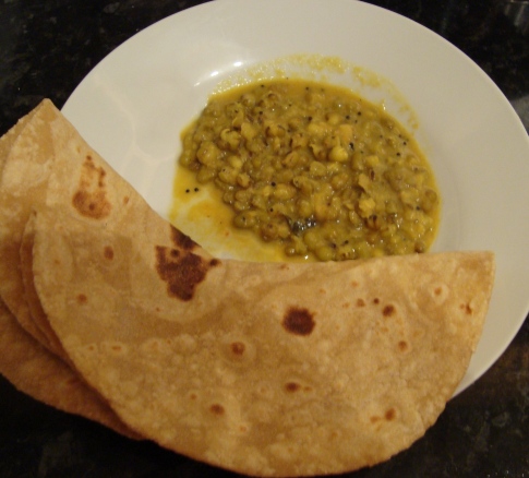 dal, rice, vegetables and chapattis