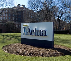 Aetna raises its 2010 profit forecast