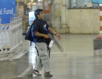 Kasab charged with waging war against India