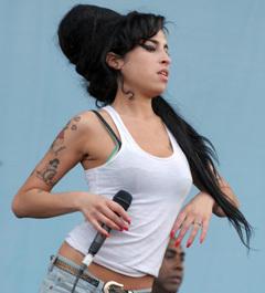 Amy Winehouse''s ''exploding boob fear'' lands her in hospital