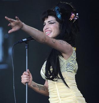 ‘Fed up Winehouse wants to settle down in home-like St.Lucia’
