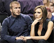Posh sending Becks sexy texts ‘to lure him back’ from Italy