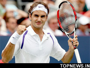 On-form Federer downs Dent as leading seeds reach quarters