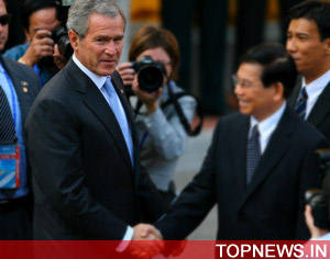 Bush arrives in Peru amid timid protests, tight security