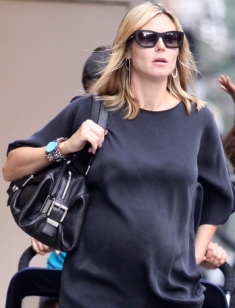 Pregnant Heidi Klum stays away from New York Fashion Week